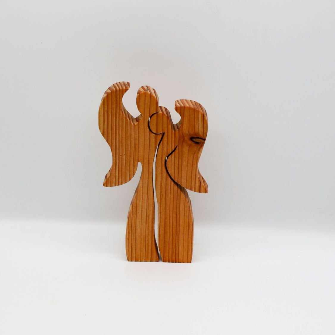 Couple of 2 angels embracing