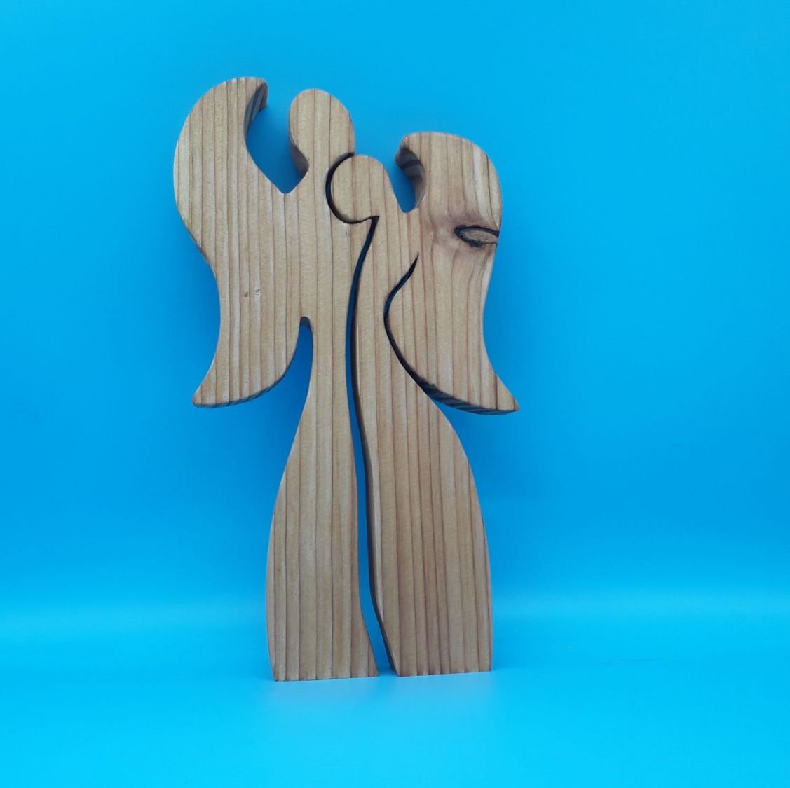 Couple of 2 angels embracing