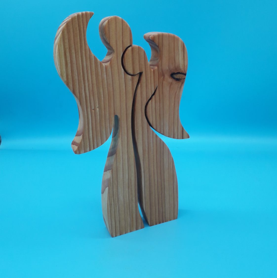 Couple of 2 angels embracing