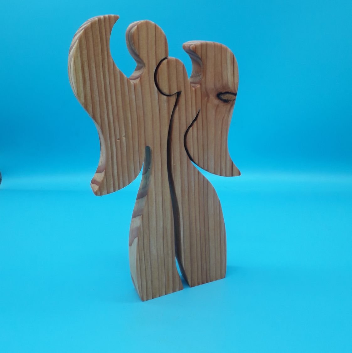 Couple of 2 angels embracing