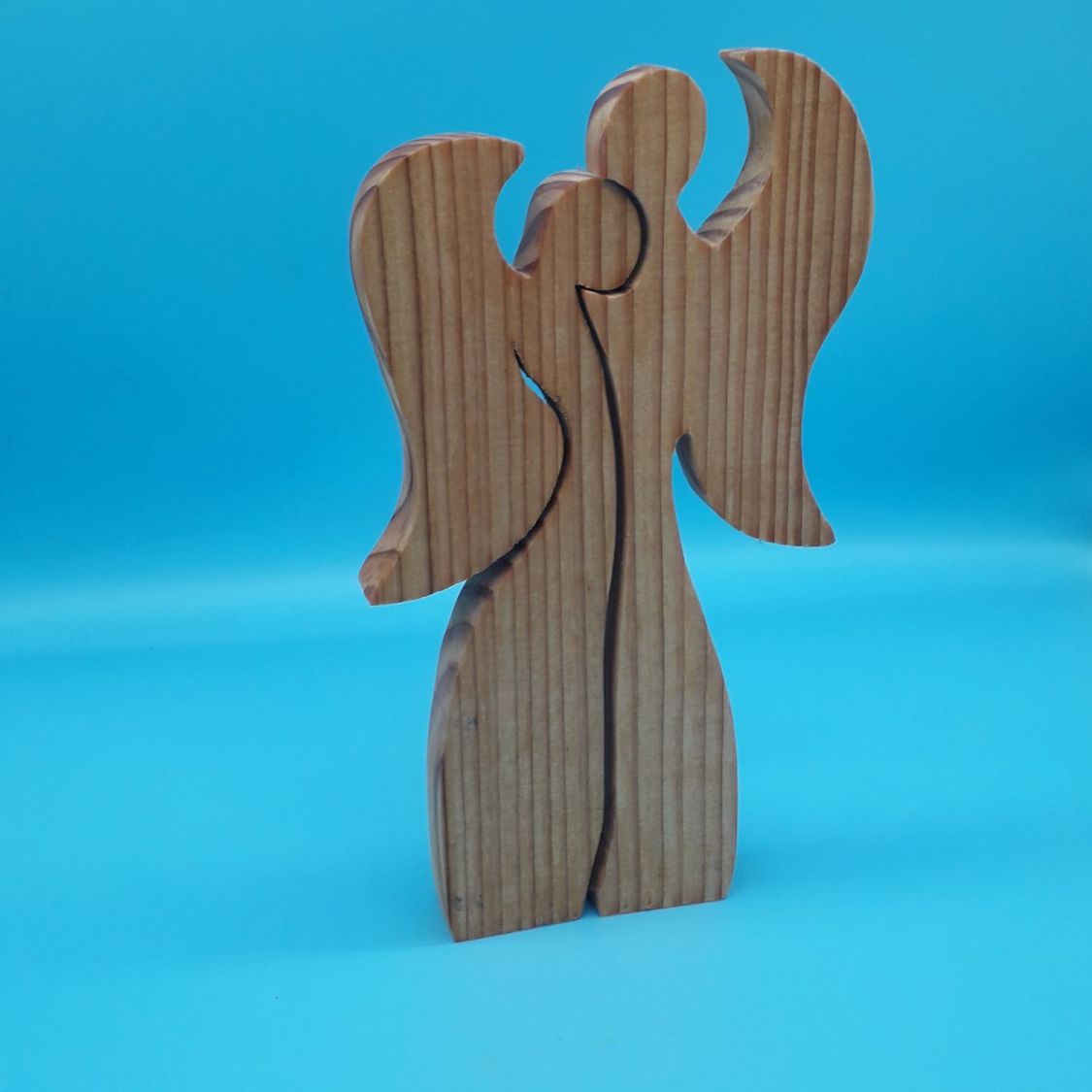 Couple of 2 angels embracing