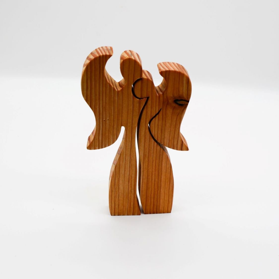 Couple of 2 angels embracing