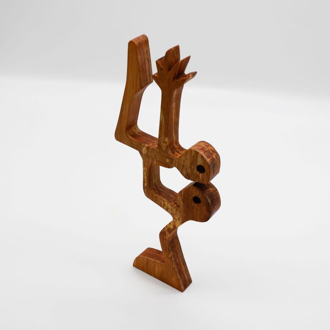 Balancing couple in solid wood