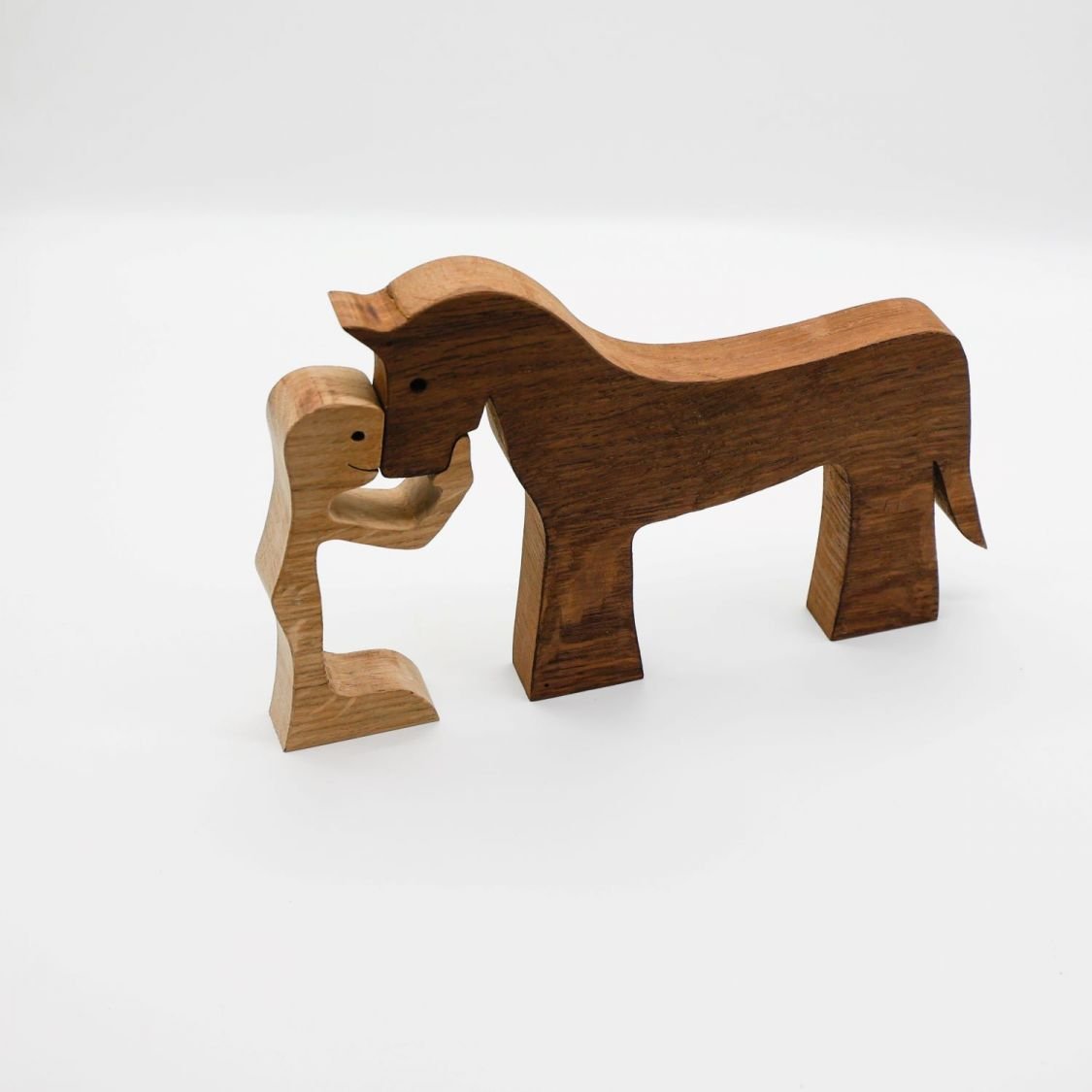 Figurine Man and his horse in wood