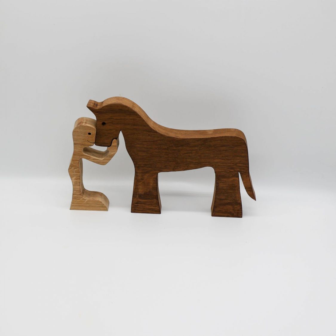 Figurine Man and his horse in wood