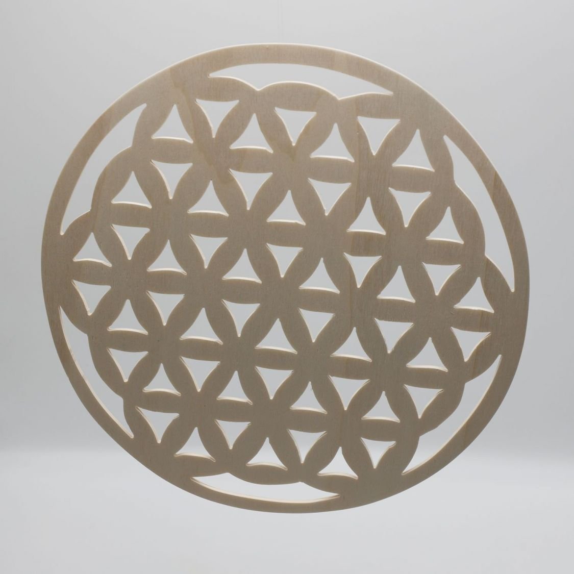 Flower of life in cut wood