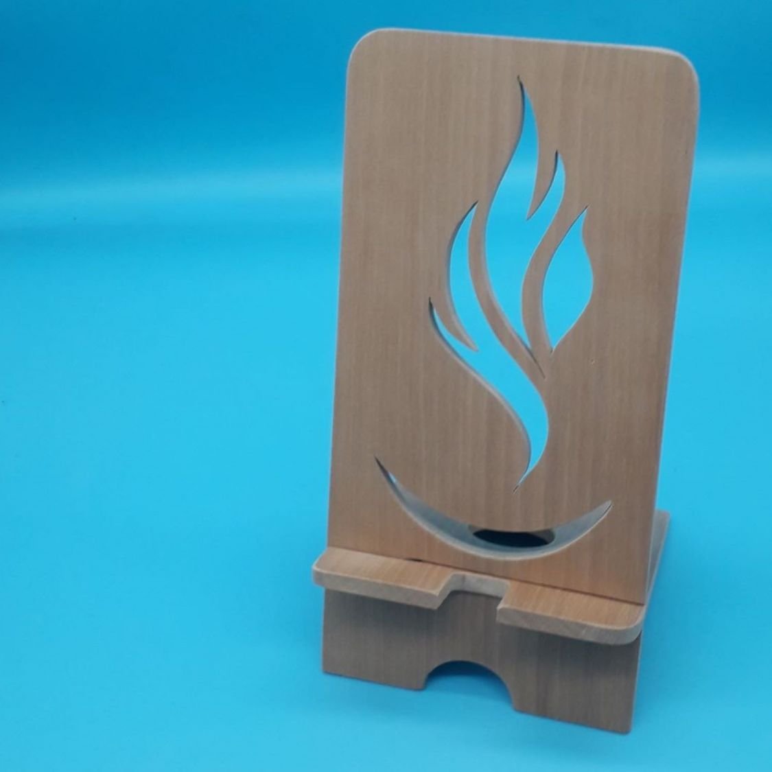 Vertical cell phone holder with flame pattern