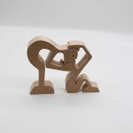 Tender kisses for this couple in wood