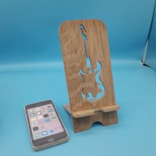 Vertical cell phone holder with guitar motif