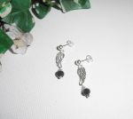 Black crystal bead earrings with wing on 925 silver studs