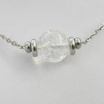 Solitaire necklace with round rock crystal stone and stainless steel beads