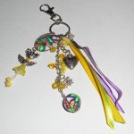 Keychain/Bag jewelry yellow doll with beads and multicolored ribbons