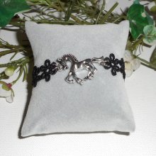 Original bracelet with silver metal horse on black lace