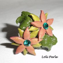 Brown clay flower ring with Swarovski crystal and green foliage