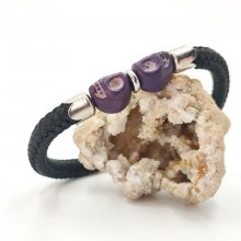 Double skull and crossbones bracelet with purple stones on black rope