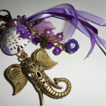 Elephant bag/keychain jewelry with clay beads, glass and purple ribbons