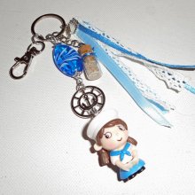 Keychain/Bag jewel with blue glass bead and small sailor with ribbons 