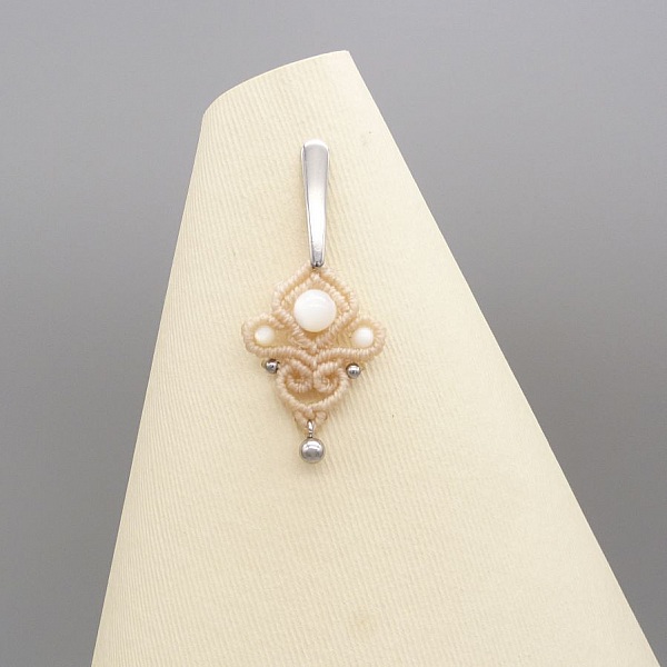 Sand tone micro-macram&eacute; earrings with mother of pearl beads