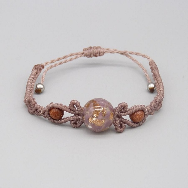Micro macram&eacute; bracelet in taupe color with a glass bead