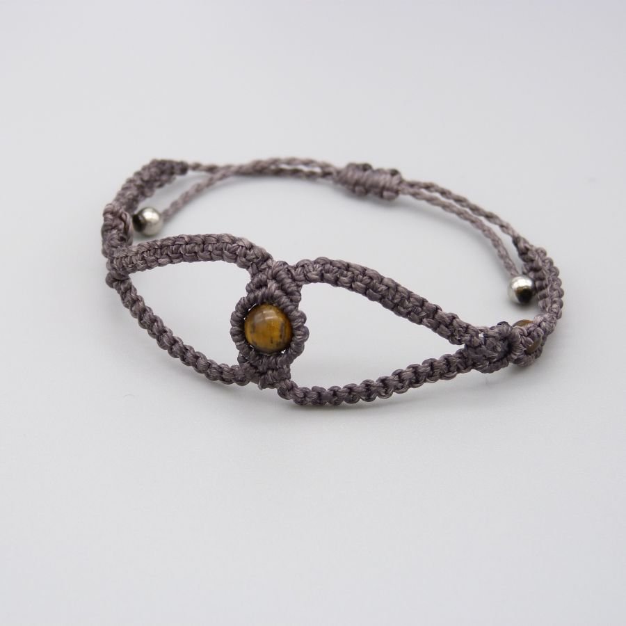 Purple micro-macramé bracelet with three tiger eye beads