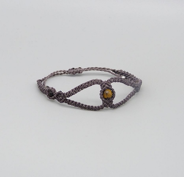 Purple micro-macram&eacute; bracelet with three tiger eye beads