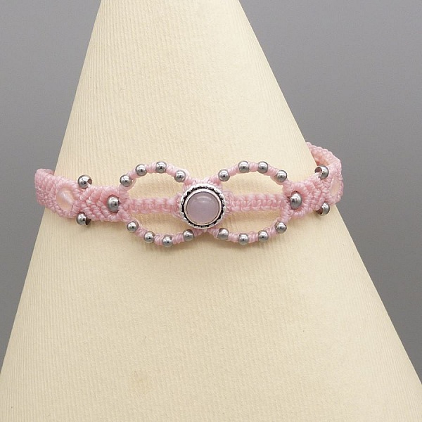 Pink micro-macram&eacute; bracelet with a stone set in pink quartz