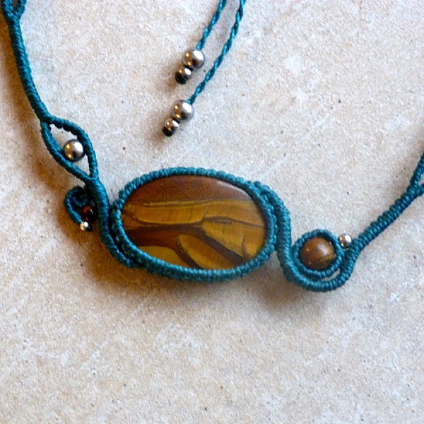 Duck blue micro-macram&eacute; necklace with a natural stone, the eye of tiger