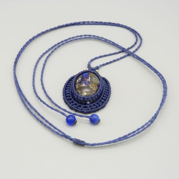 Dark blue micro-macram&eacute; necklace with a stone cabochon