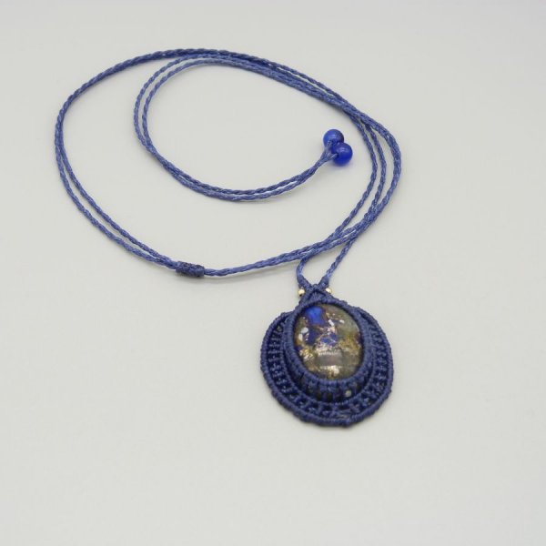 Dark blue micro-macram&eacute; necklace with a stone cabochon