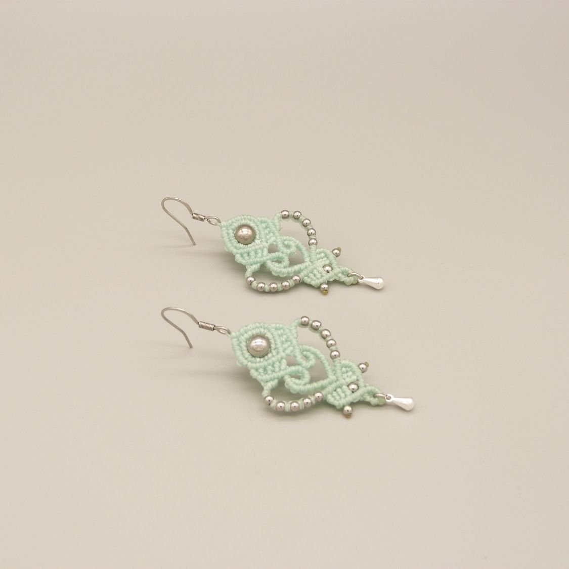 Pair of green water mint earrings in micro-macramé 