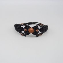 Black micro-macramé bracelet with a central "sun stone" bead