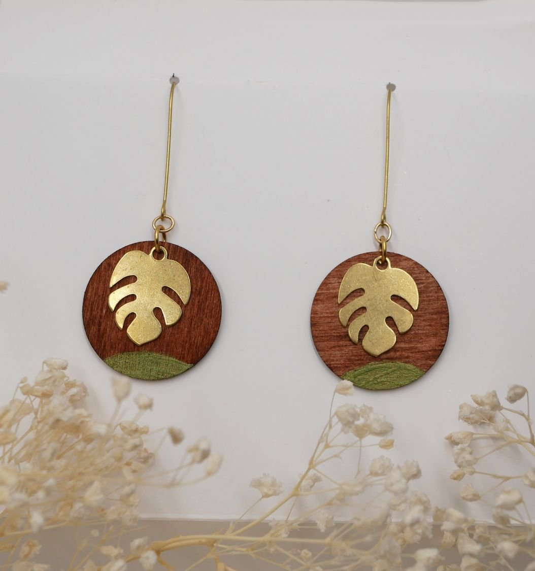 Cherry wood and monstera leaf earrings in gold plated brass