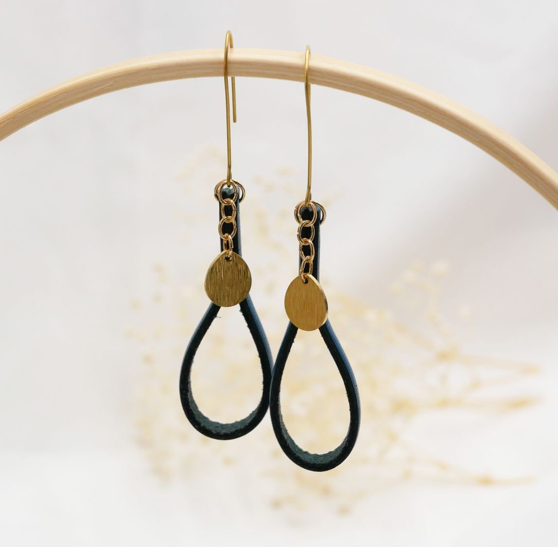 Blue leather earrings with gold tassel