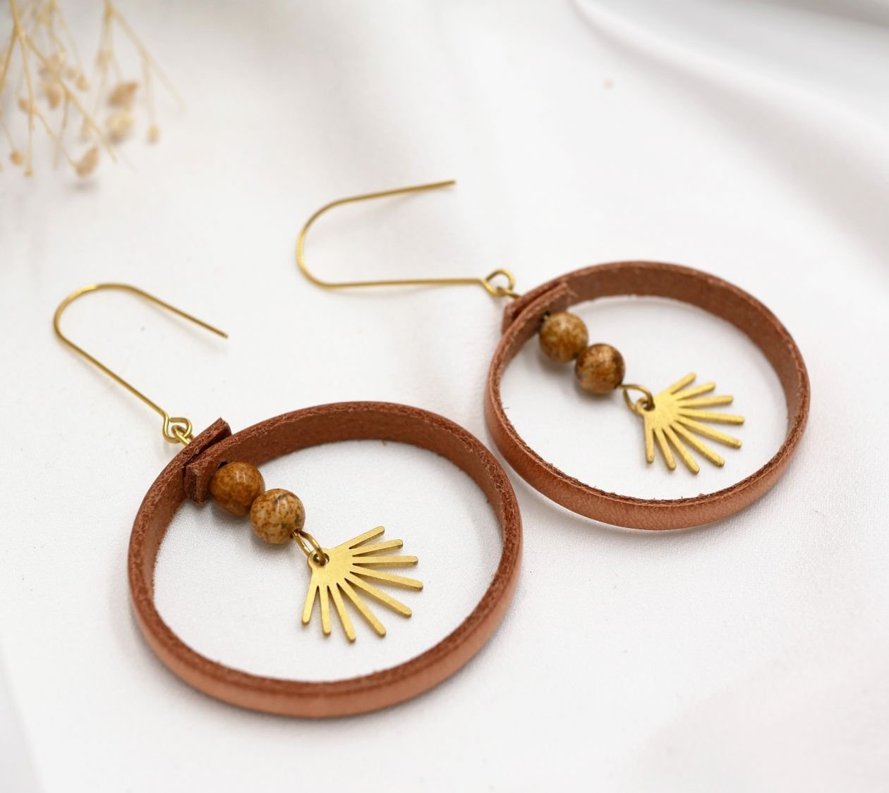 Round natural leather earrings