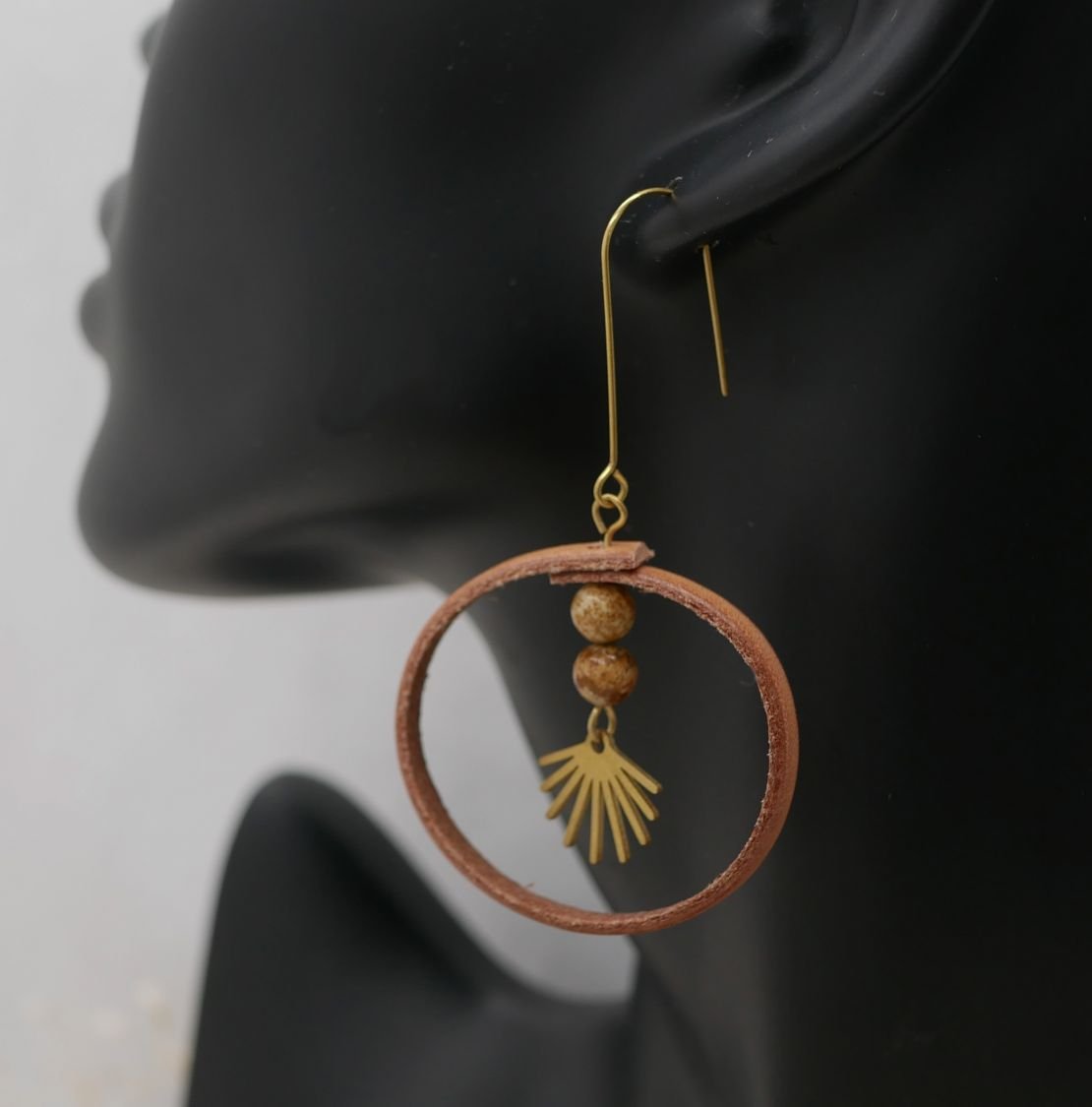 Round natural leather earrings