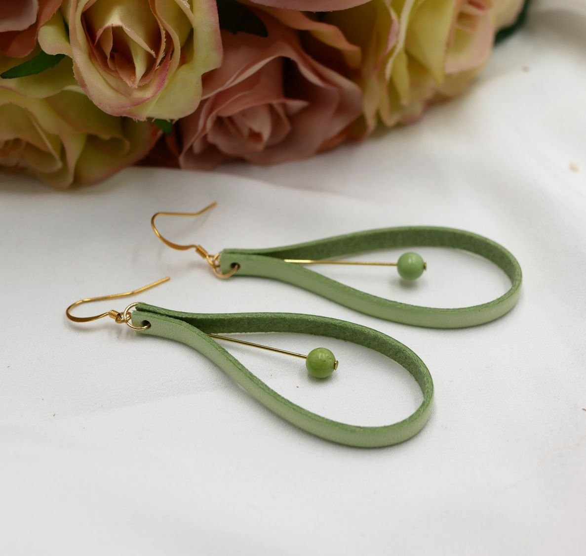 Almond green leather and light green gemstone earrings