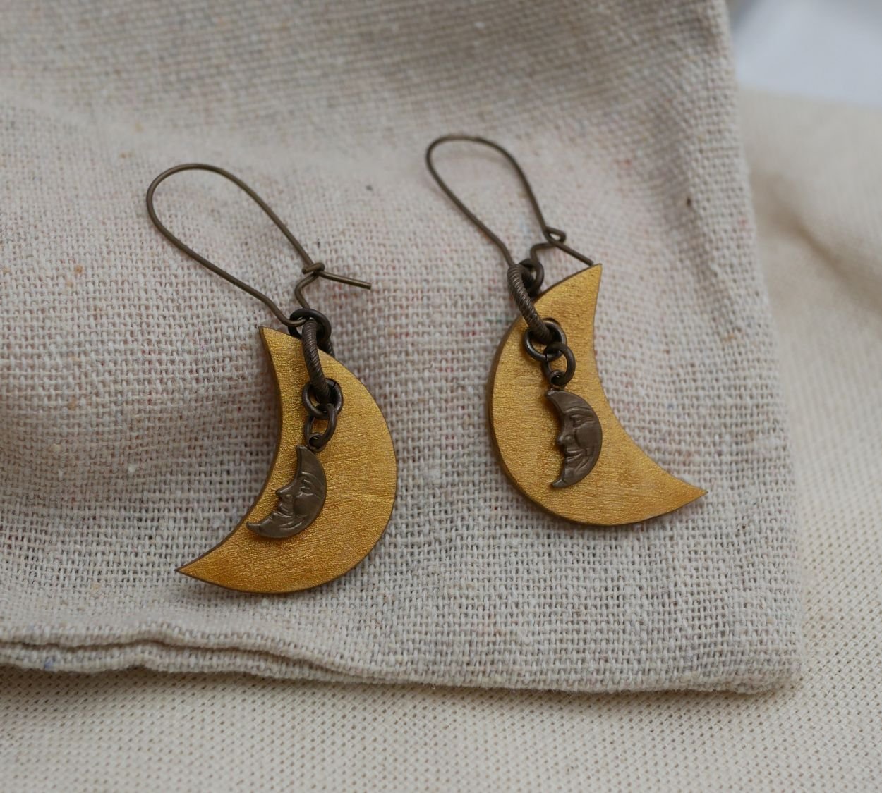 Wooden moon earrings with brass charms