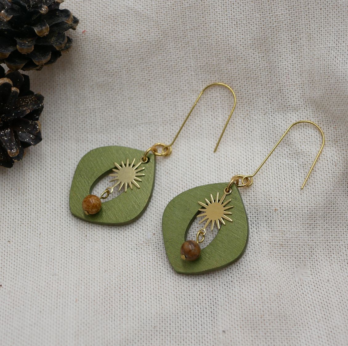 Metallic green wood and gold sun pendant earrings