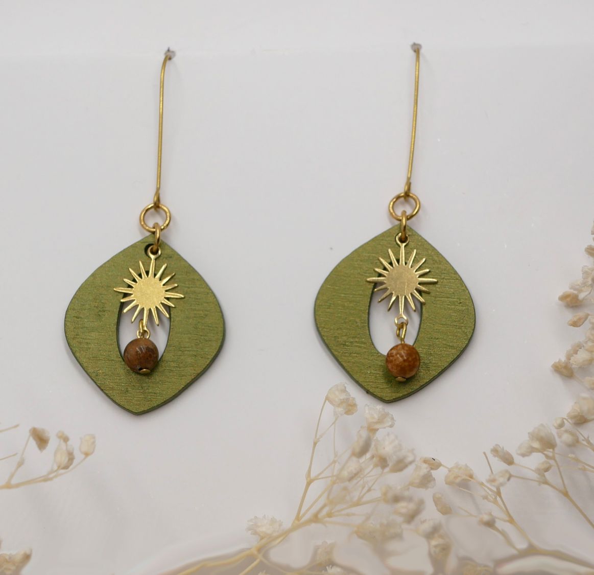 Metallic green wood and gold sun pendant earrings