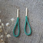 Jade leather earrings with long golden rectangular studs