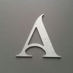 Brushed metal letter SHANGRI LA