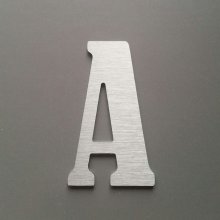 Brushed metal letter BERNARD CONDENSED