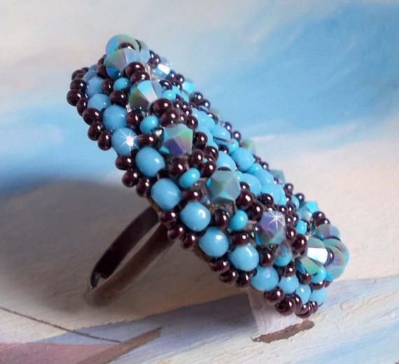 Naiad ring embroidered with a turquoise blue resin cabochon and crystal, a beautiful play of light.