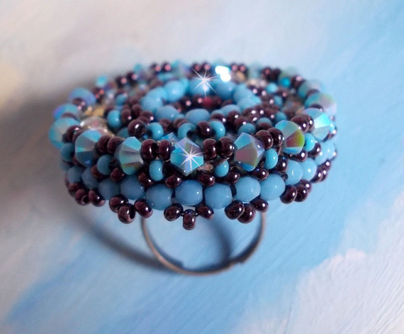 Naiad ring embroidered with a turquoise blue resin cabochon and crystal, a beautiful play of light.