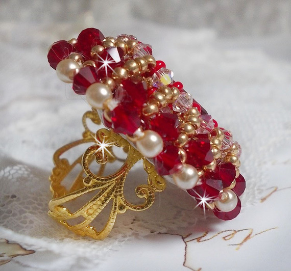 Ruby ring embroidered with a bohemian crystal cabochon