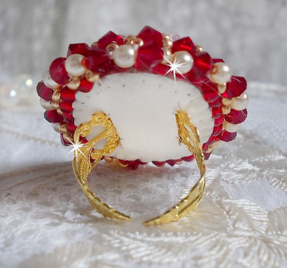 Ruby ring embroidered with a bohemian crystal cabochon