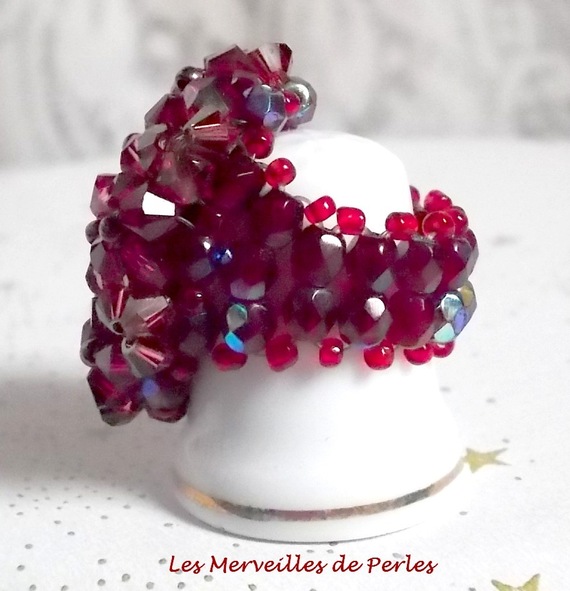 Orchid ring with facets and spinning tops in Swarovski crystal