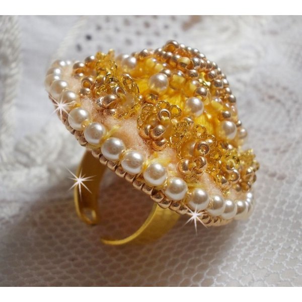Buttercup ring embroidered with a Swarovski crystal and yellow DMC cotton