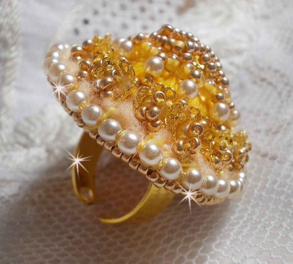 Buttercup ring embroidered with a Swarovski crystal and yellow DMC cotton