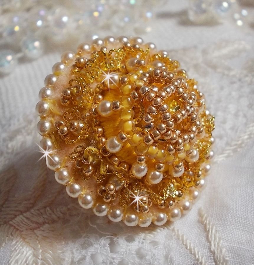 Buttercup ring embroidered with a Swarovski crystal and yellow DMC cotton